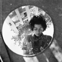 Vivian Maier. Shadows and mirrors
