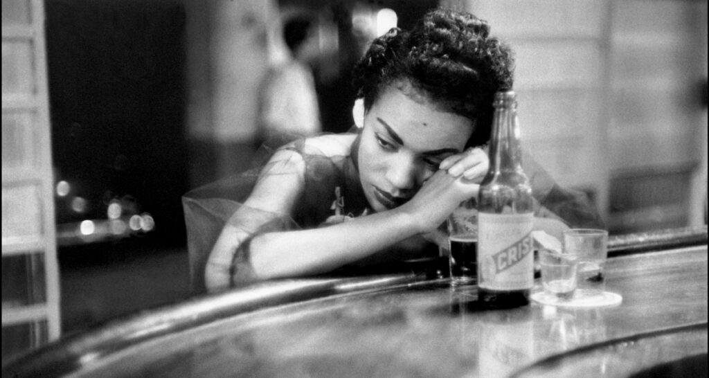 Bar girl in a brothel in the red light district, Havana, Cuba, 1954 © Eve Arnold / Magnum Photos
